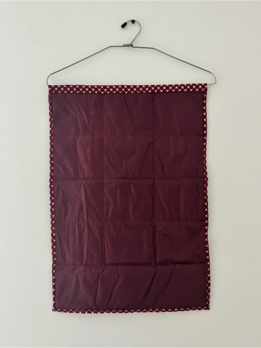 Burgundy patterned hanger organizer with 13 pockets